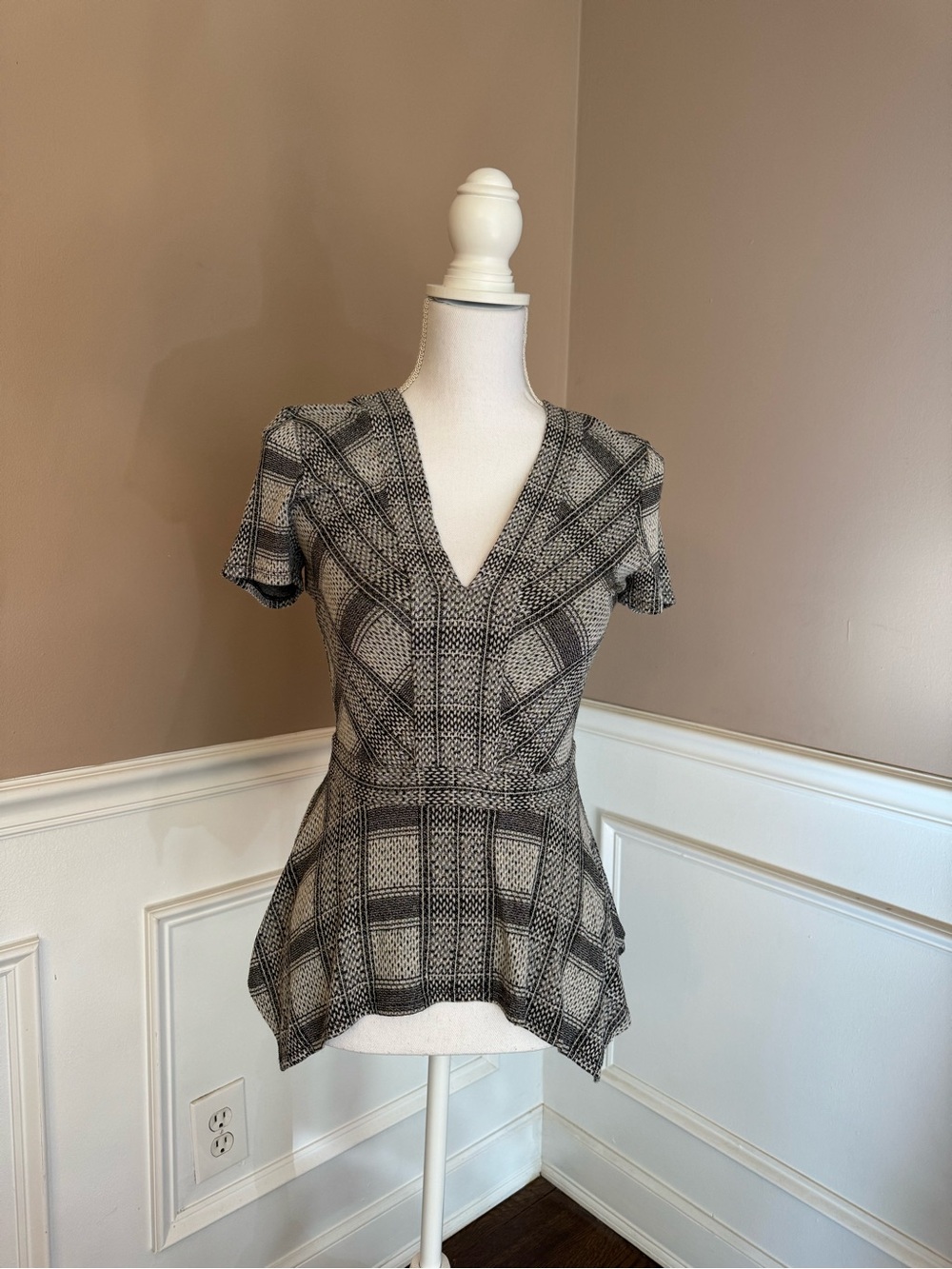 BCBGMaxAzria Black and Cream Plaid V-Neck Peplum Tunic